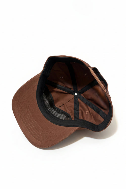 A brown baseball cap shown from an overhead angle, highlighting the brown fabric interior, black adjustable strap, and black mesh backing, set against a plain white background.