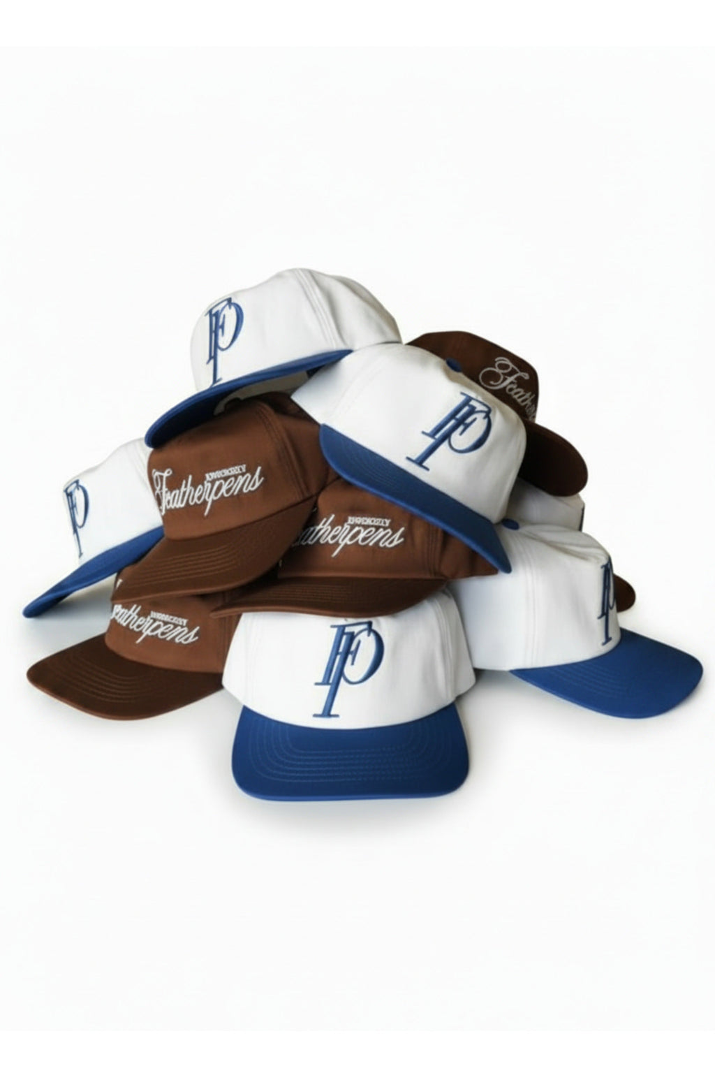 A pile of baseball caps in white, brown, and blue, each featuring a blue embroidered letter 'FP' on the front and 'Philadelphia' script on the side, set against a plain white background.